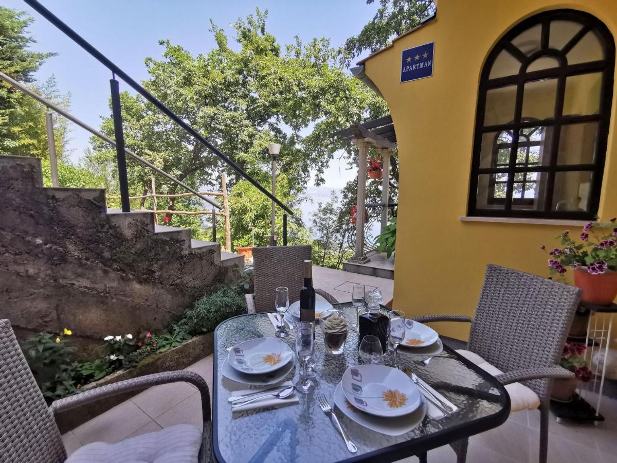Apartment Delost Ловран Экстерьер фото